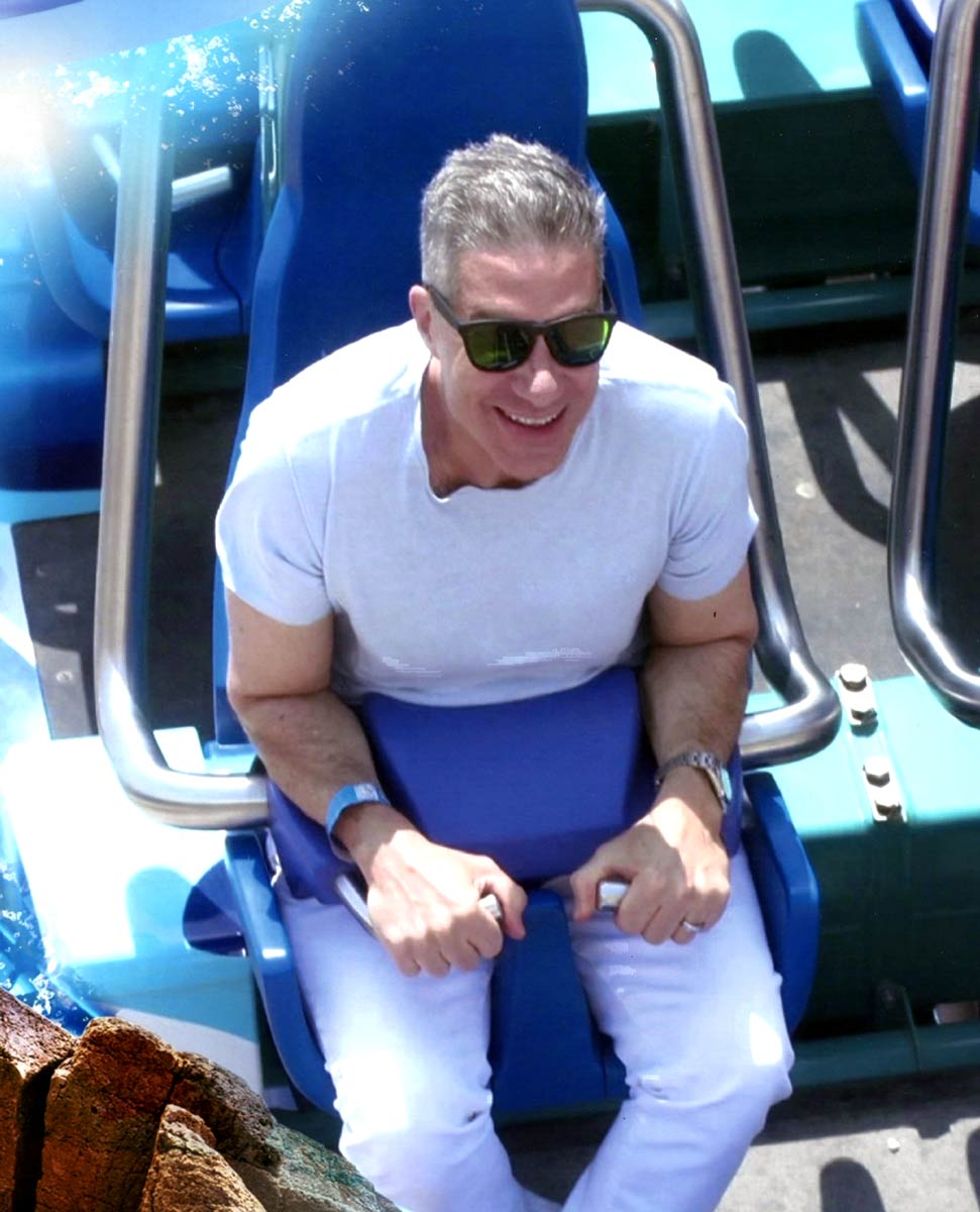 A man wears MiOptics Sport on a rollercoaster to reduce motion sickness.