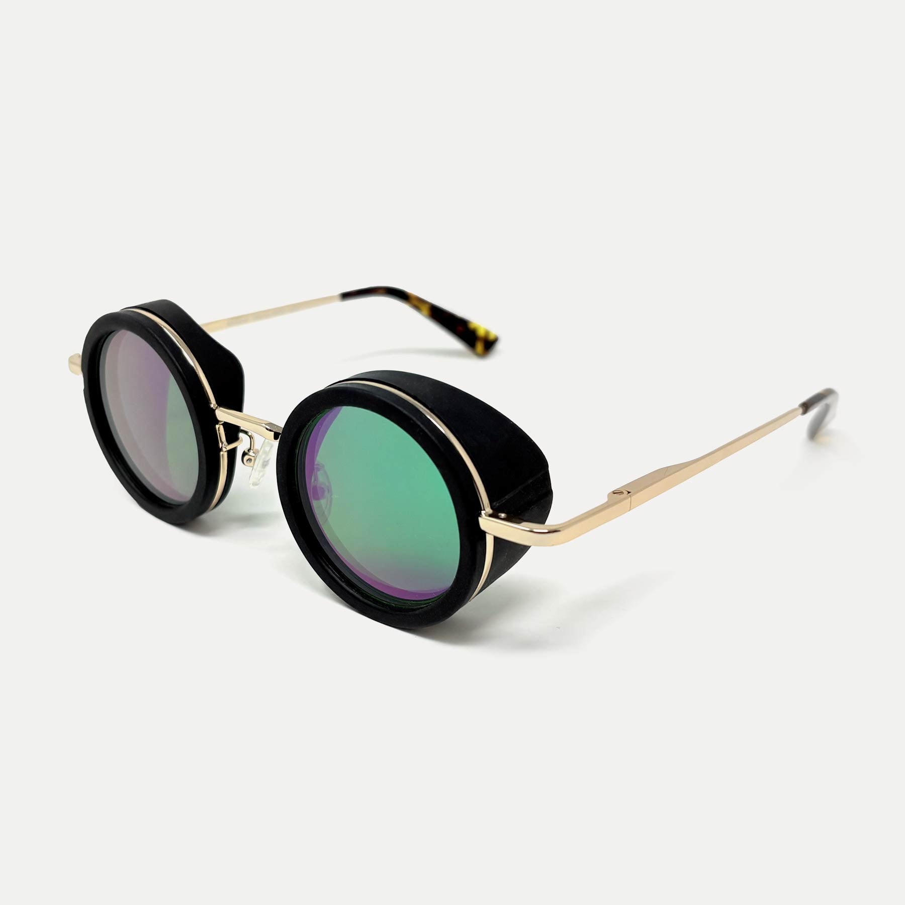 A pair of MiOptics Pro nbGL glasses with gold metal frame, black rubber eye shields, and Italian acetate temple tips.