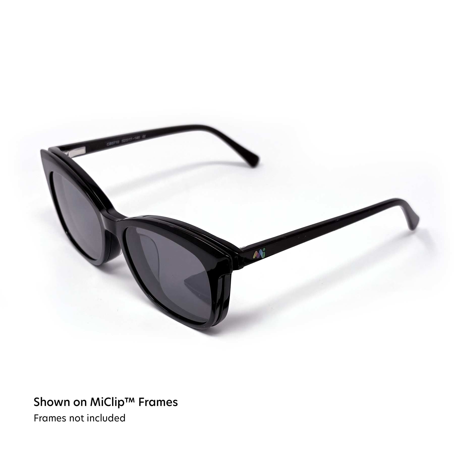 A photo of stylish MiClips glasses with a the Sunglasses add-on magnetically attached.